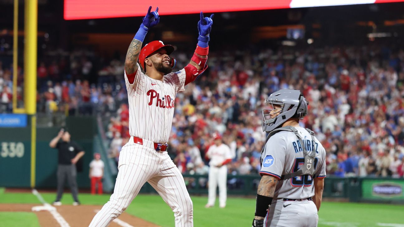 Phillies hit team-record 8 homers to clinch first-round bye