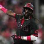 Reds hit 5 home runs to power past Cubs in 7-4 win