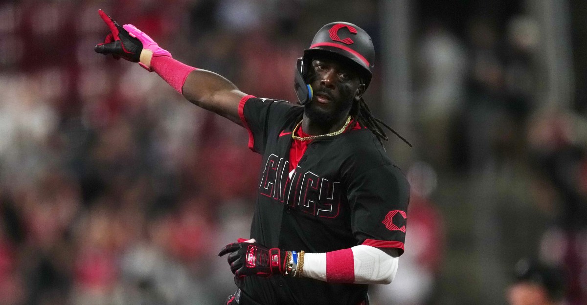 Reds hit 5 home runs to power past Cubs in 7-4 win