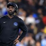 What happens to a college football roster when a coach is fired in September?