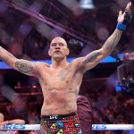 Alex Pereira, of Brazil, celebrates after defeating UFC light heavyweight champion Magomed Ankalaev, of Russia during the UFC 320 mixed martial arts bout Saturday, Oct. 4, 2025, in Las Vegas. (Steve Marcus/Las Vegas Sun via AP)