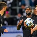 Tottenham Hotspur's Micky van de Ven, right, celebrates scoring with teammates during the Champions League game against Bodo/Glimt