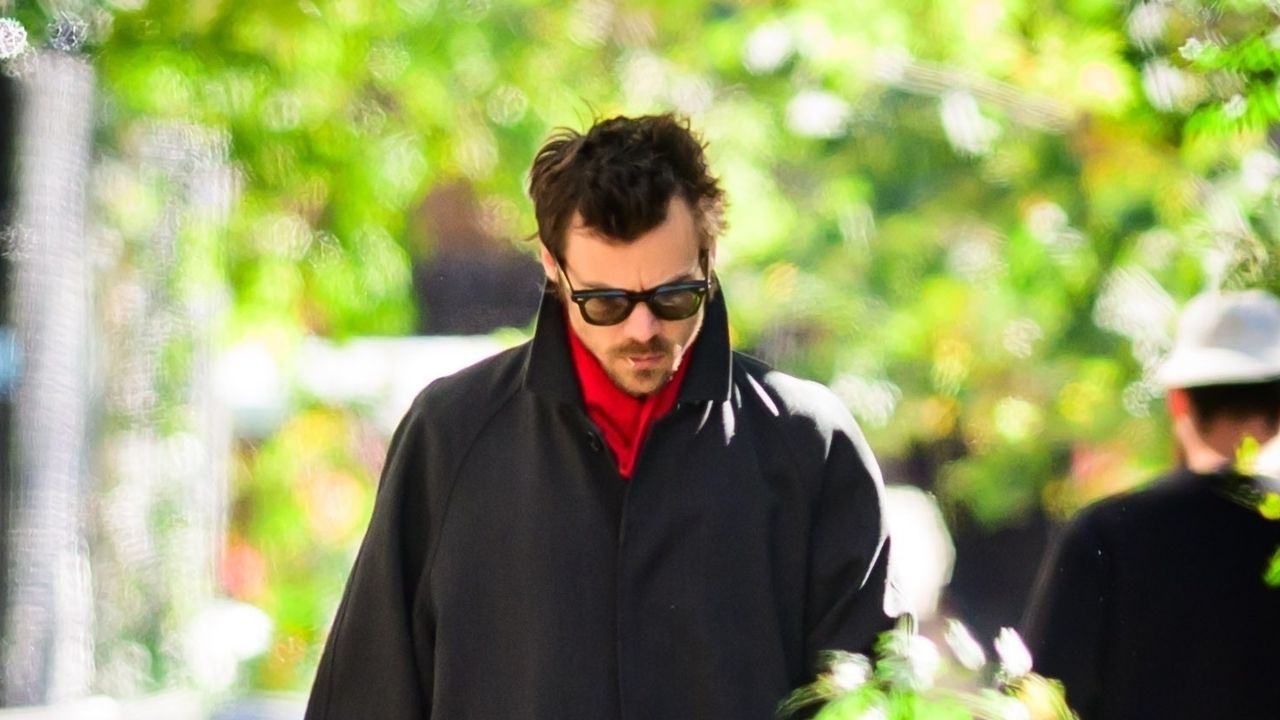 Harry Styles Wraps up a Perfect Fall Outfit With a Pop of Red