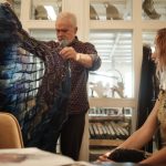 Marc Happel and Iris Van Herpen inspecting a costume for the New York City Ballet fall fashion gala 2025.
