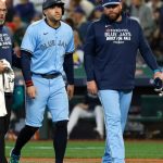 Jays' George Springer hit on knee by pitch; X-rays negative
