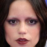 Jenna Ortega’s Crimped Hair Is The Perfect Blend of Edgy & Nostalgic