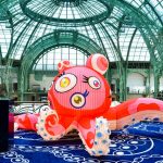 The Louis Vuitton stand at Art Basel Paris featuring artworks and handbag designs by Takashi Murakami