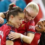 Anna Sandberg (centre) celebrates Manchester United's equaliser against Chelsea