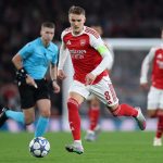 LONDON, ENGLAND: Martin Odegaard of Arsenal during the UEFA Champions League 2025/26 League Phase MD2 match between Arsenal FC and Olympiacos FC at...