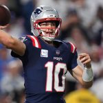 New England Patriots quarterback Drake Maye (10) throws against the Buffalo Bills during the second half of an NFL football game, Sunday, Sept. 5, 2025, in Orchard Park, N.Y. (AP Photo/Gene J. Puskar)