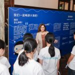 Francesca Santoro, IOC Senior Programme Officer with children from the inland Guizhou province, who have never seen the ocean, at the Prada Sea Beyond exhibition in Rong Zhai, Shanghai