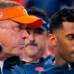 Denver Broncos head coach Sean Payton talks with Denver Broncos quarterback Russell Wilson (3) during a preseason NFL football game against the Los Angeles Rams Saturday, Aug. 26, 2023, in Denver. (AP Photo/Jack Dempsey)