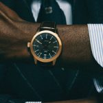 IWC Ingenieur vintage watch; Cesare Attolini wool jacket, suit, cotton shirt and tie; Celine Homme by Hedi Slimane belt.