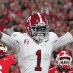 Alabama Crimson Tide wide receiver Isaiah Horton (1) celebrates after scoring a touchdown against the Georgia Bulldogs in the second quarter at Sanford Stadium.