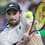 Valentin Vacherot of Monaco plays a return to Arthur Rinderknech of France..during the final of the Shanghai Masters tennis tournament at Qizhong Forest Sports City Tennis Center, in Shanghai, China, Sunday, Oct. 12, 2025. (AP Photo/Andy Wong)