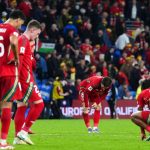 Wales players look dejected at full-time