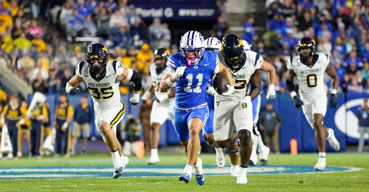 West Virginia football trails No. 23 BYU 28–10 at halftime