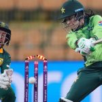 Fatima Sana of Pakistan is bowled out by Nondumiso Shangase of South Africa (not pictured) as wicket keeper Karabo Meso looks on during the